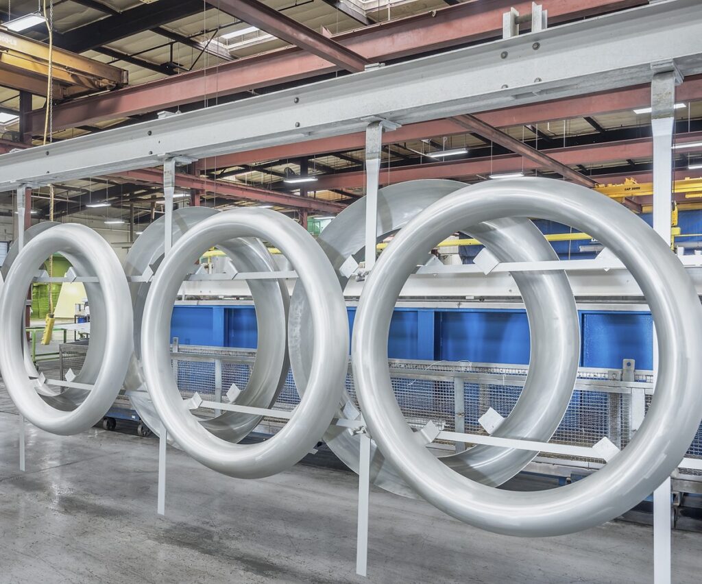 ndustrial surface finishing workshop with parts undergoing plating or coating process